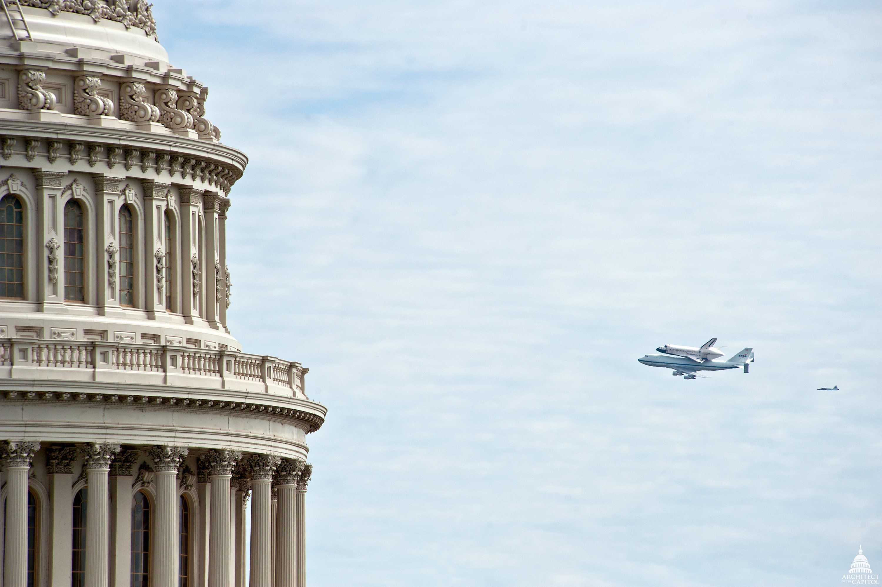 Space Shuttle Discovery over Washington, DC